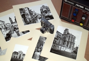 Stampe fotografiche e una macchina fotografica Voigtlander Prominent. Scatto di Roberto Ellero