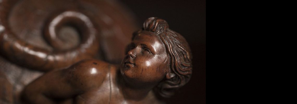 Eva, particolare del basamento di Cristo crocifisso -  Musei Civici di Belluno