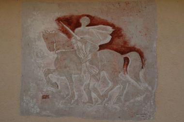 Particolare dell’affresco con San Martino che dona al povero metà del suo mantello